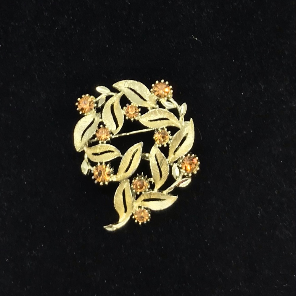 Vintage Usher signed floral brooch